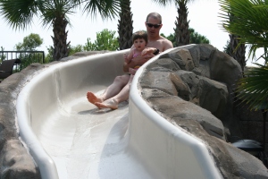 Maddie and her daddy on the little slide